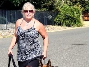 Lori walking her dog