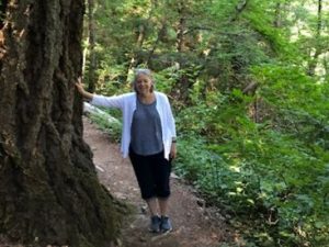 Mary hiking in the redwoods